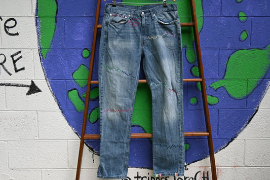 Tripp's Store / Levi's bespoke art jeans; OOAK art jeans; embellished jeans; boot cut jeans; hand-stitched jeans